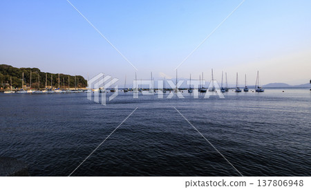 Winter at Kou Yacht Harbor in Numazu City, West Izu, on the scenic Izu Peninsula. Winter at Kou Yacht Harbor in Numazu City, West Izu, on the scenic Izu Peninsula. 137806948