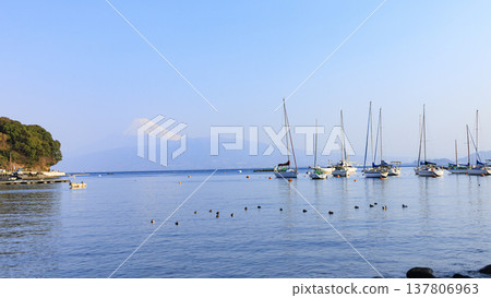Winter at Kou Yacht Harbor in Numazu City, West Izu, on the scenic Izu Peninsula. Winter at Kou Yacht Harbor in Numazu City, West Izu, on the scenic Izu Peninsula. 137806963