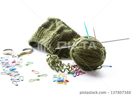 knitting hobby concept with yarn needles and colorful markers knitting hobby concept with yarn needles and colorful markers 137807388