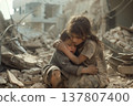 A brother and sister huddled together amidst the rubble. A brother and sister huddled together amidst the rubble. 137807400