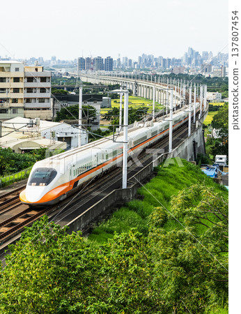 Overlooking view of the Taiwan High Speed Rail trains passing Changhua in Taiwan. It is the only high-speed railway in Taiwan. Overlooking view of the Taiwan High Speed Rail trains passing Changhua in Taiwan. It is the only high-speed railway in Taiwan. 137807454