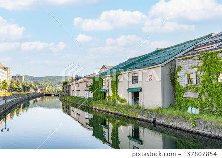 Otaru City, Hokkaido: A popular tourist destination in Hokkaido - Scenery of the Otaru Canal in early summer. Otaru City, Hokkaido: A popular tourist destination in Hokkaido - Scenery of the Otaru Canal in early summer. 137807854