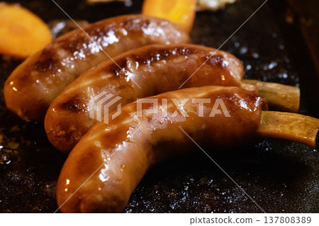 Bone-in sausages to grill on a barbecue 137808389