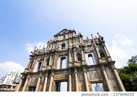 The ruins of St. Paul's Cathedral at Jesus Company Square in Macau, China, are a historic architectural landmark and a UNESCO World Heritage. The ruins of St. Paul's Cathedral at Jesus Company Square in Macau, China, are a historic architectural landmark and a UNESCO World Heritage. 137809030