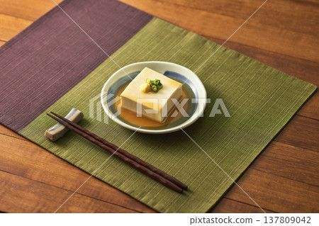 Cold tofu and chopsticks Cold tofu and chopsticks 137809042
