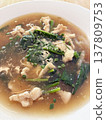 Thai noodle soup Asian cuisine chicken noodle rice noodle hot soup savory broth green vegetable comfort food closeup dish homemade meal comforting Thai noodle soup with chicken noodle savory broth 137809753