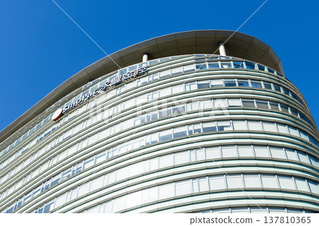 Low-angle view of the SinoPac Financial Holdings building in Taipei, Taiwan.  The SinoPac Financial Holdings building in Taipei, Taiwan. 137810365