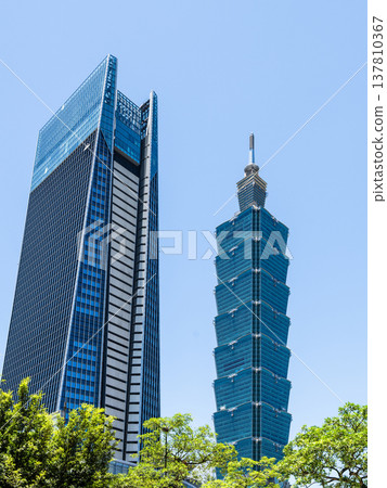 Low-angle view of Taipei 101 Skyscraper and Nan Shan Plaza building in Taiwan. Low-angle view of Taipei 101 Skyscraper and Nan Shan Plaza building in Taiwan. 137810367