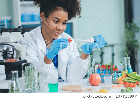 Chemical Laboratory of the Food supply . Food in laboratory, dna modify .GMO Genetically modified food in lab . Chemical Laboratory of the Food supply . Food in laboratory, dna modify .GMO Genetically modified food in lab . 137810997