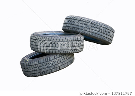 Three car wheels on white. Seasonal change of car Three car wheels on white. Seasonal change of car 137811797