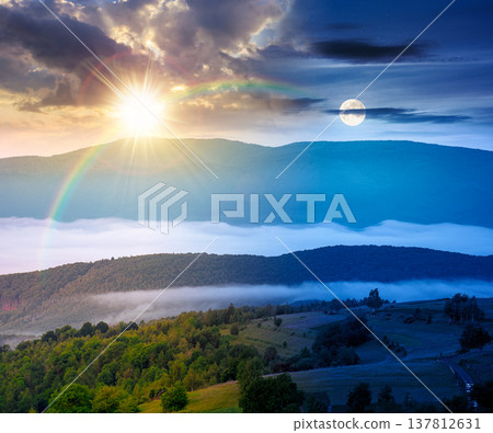mountainous rural area during summer solstice. day meet night. sun and moon over remote mountain landscape with forested rolling hills. wonderful foggy place of alpine countryside wallpaper mountainous rural area during summer solstice. day meet night. sun and moon over remote mountain landscape with forested rolling hills. wonderful foggy place of alpine countryside wallpaper 137812631