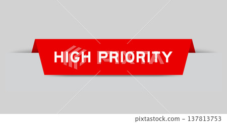 Red color inserted label with word high priority on gray background Red color inserted label with word high priority on gray background 137813753
