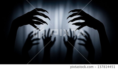 Spooky silhouette of monster claws and human hands pressing against fabric screen creating scary horror atmosphere for halloween holiday celebration or nightmare concept 137814451