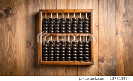 A simple image of a wooden abacus, photographed from directly above, illustrating learning and calculation, ideal for education and business use. A simple image of a wooden abacus, photographed from directly above, illustrating learning and calculation, ideal for education and business use. 137815454