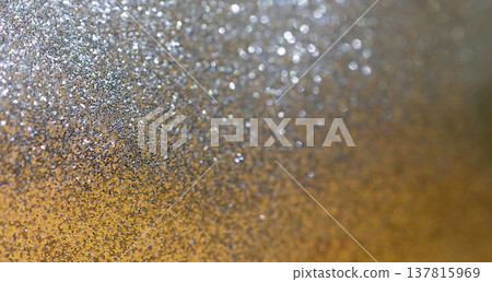 Gold background with silver glitter and partial blur. Luxurius background concept Gold background with silver glitter and partial blur. Luxurius background concept 137815969