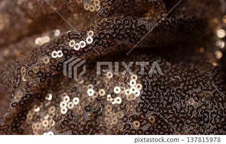 Horizontal shiny wavy shot texture for wallpaper.Gold sequined fabric. Abstract background Horizontal shiny wavy shot texture for wallpaper.Gold sequined fabric. Abstract background 137815978
