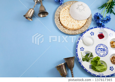 Passover seder plate with matzah and kippah for jewish holiday Passover seder plate with matzah and kippah for jewish holiday 137817365