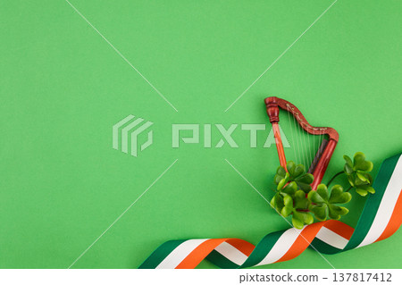 St. Patrick's day harp shamrock and irish flag on green 137817412