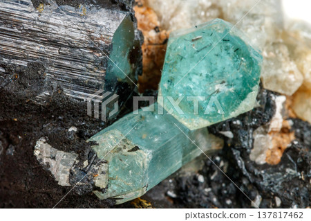 Macro mineral stone Aquamarine and black tourmaline, Schorl on a white background 137817462