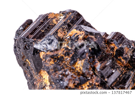 macro mineral stone sherle, schorl, black tourmaline on white background macro mineral stone sherle, schorl, black tourmaline on white background 137817467
