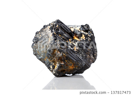 macro mineral stone sherle, schorl, black tourmaline on white background macro mineral stone sherle, schorl, black tourmaline on white background 137817473
