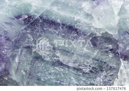 Macro mineral stone Fluorite on white background Macro mineral stone Fluorite on white background 137817476