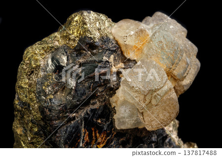 Macro of a mineral stone Sphalerite with fluorite and pyrite on a black 137817488