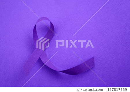 Purple awareness ribbon symbolizing support and solidarity 137817569