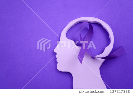 Human head silhouette with purple awareness ribbon 137817588