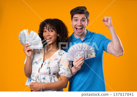 Rich Couple, Usd Currency. Lucky Man Woman With Money On Yellow, Success, Gain Rich Couple, Usd Currency. Lucky Man Woman With Money On Yellow, Success, Gain 137817841