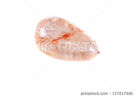 Macro mineral stone Rutile in quartz on a white background Macro mineral stone Rutile in quartz on a white background 137817886