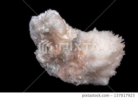 Macro mineral Scolecite stone on a black background Macro mineral Scolecite stone on a black background 137817923