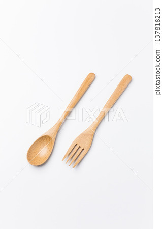 Wooden spoon and fork on a white background Wooden spoon and fork on a white background 137818213