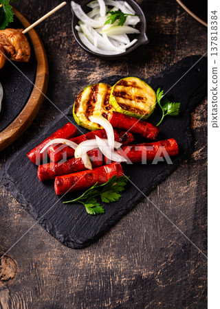 Assortment of grilled bbq meat and vegetables Assortment of grilled bbq meat and vegetables 137818384