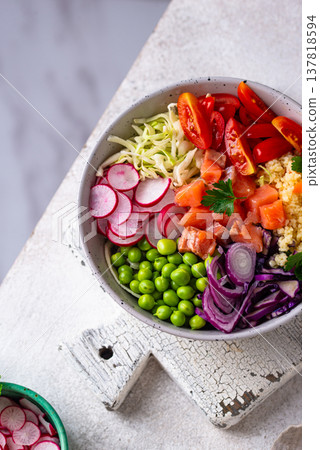 Balanced healthy bowl with vegetables and salmon Balanced healthy bowl with vegetables and salmon 137818594