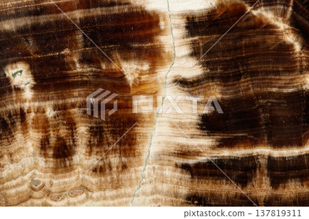 Macro stone mineral onyx marble on a black background Macro stone mineral onyx marble on a black background 137819311