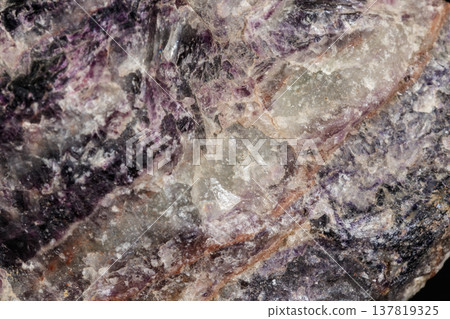 Macro stone mineral Fluorite on a black background Macro stone mineral Fluorite on a black background 137819325