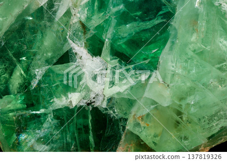 Macro stone mineral Fluorite on a black background 137819326