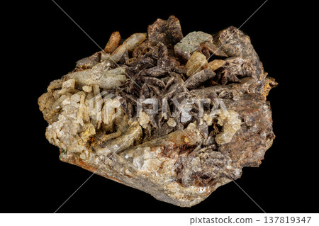 Macro stone axinite mineral on a black background Macro stone axinite mineral on a black background 137819347