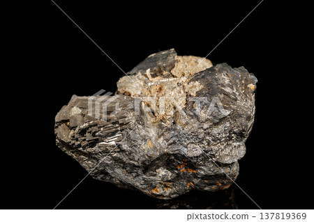 Macro stone Pyrite mineral with fluorite on a black background 137819369