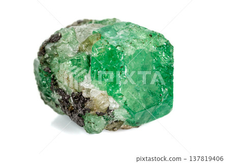 Macro stone garnet mineral, Uvarovite in rock on a white background Macro stone garnet mineral, Uvarovite in rock on a white background 137819406