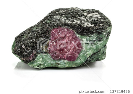 Macro of mineral stone ruby in rock on white background 137819456