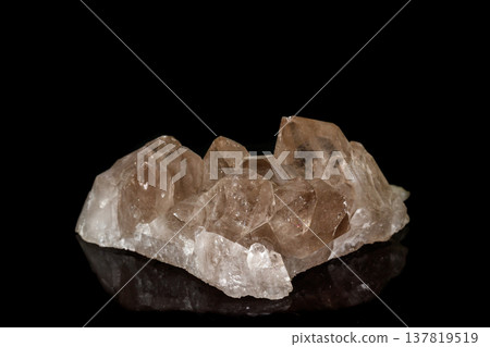 Macro mineral stone smoky quartz, rauchtopaz on a black background Macro mineral stone smoky quartz, rauchtopaz on a black background 137819519
