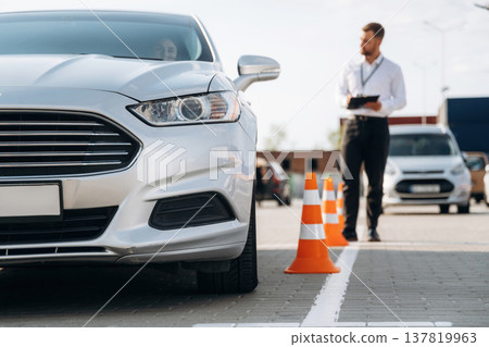 Conception of learning. Woman is trying to pass exam in the driving school Conception of learning. Woman is trying to pass exam in the driving school 137819963