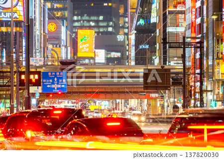 Ginza night view where Shinkansen bullet trains and major roads intersect. 137820030