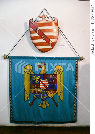 Romania, Transylvania region, Bran village, Bran Castle, the castle that served as the model for Dracula's castle, national flag Romania, Transylvania region, Bran village, Bran Castle, the castle that served as the model for Dracula's castle, national flag 137820434