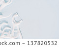 White dental floss picks scattered on light blue background, oral hygiene concept with copy space 137820532