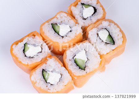 Overhead sushi presentation for social media. Neatly arranged sushi slices from above for culinary sharing. Topdown view of meticulously organized sushi rolls perfect for posting Overhead sushi presentation for social media. Neatly arranged sushi slices from above for culinary sharing. Topdown view of meticulously organized sushi rolls perfect for posting 137821999