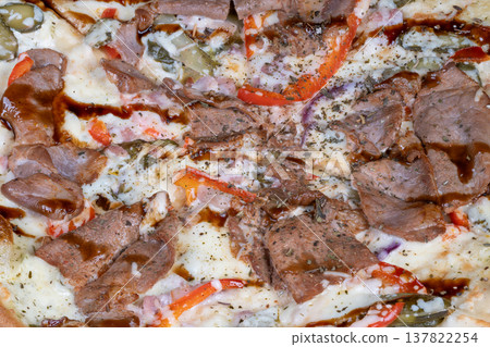 Macro view of teriyaki pizza texture tender meat folds, stringy melted cheese, glossy sauce lines and diced peppers with visible seasoning for highdetail food photography content Macro view of teriyaki pizza texture tender meat folds, stringy melted cheese, glossy sauce lines and diced peppers with visible seasoning for highdetail food photography content 137822254