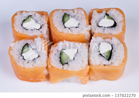 Gourmet sushi rolls with precise cuts and elegant presentation, fine dining vibe, minimalist white plate, subtle shadowing, refined texture highlighting quality ingredients Gourmet sushi rolls with precise cuts and elegant presentation, fine dining vibe, minimalist white plate, subtle shadowing, refined texture highlighting quality ingredients 137822270